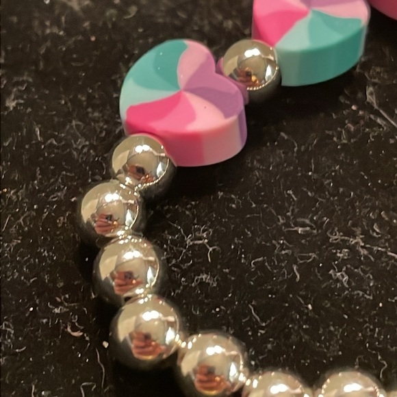 7” beaded stackable stretch bracelet with 23 silver beads & 4 heart shaped beads - Picture 11 of 13